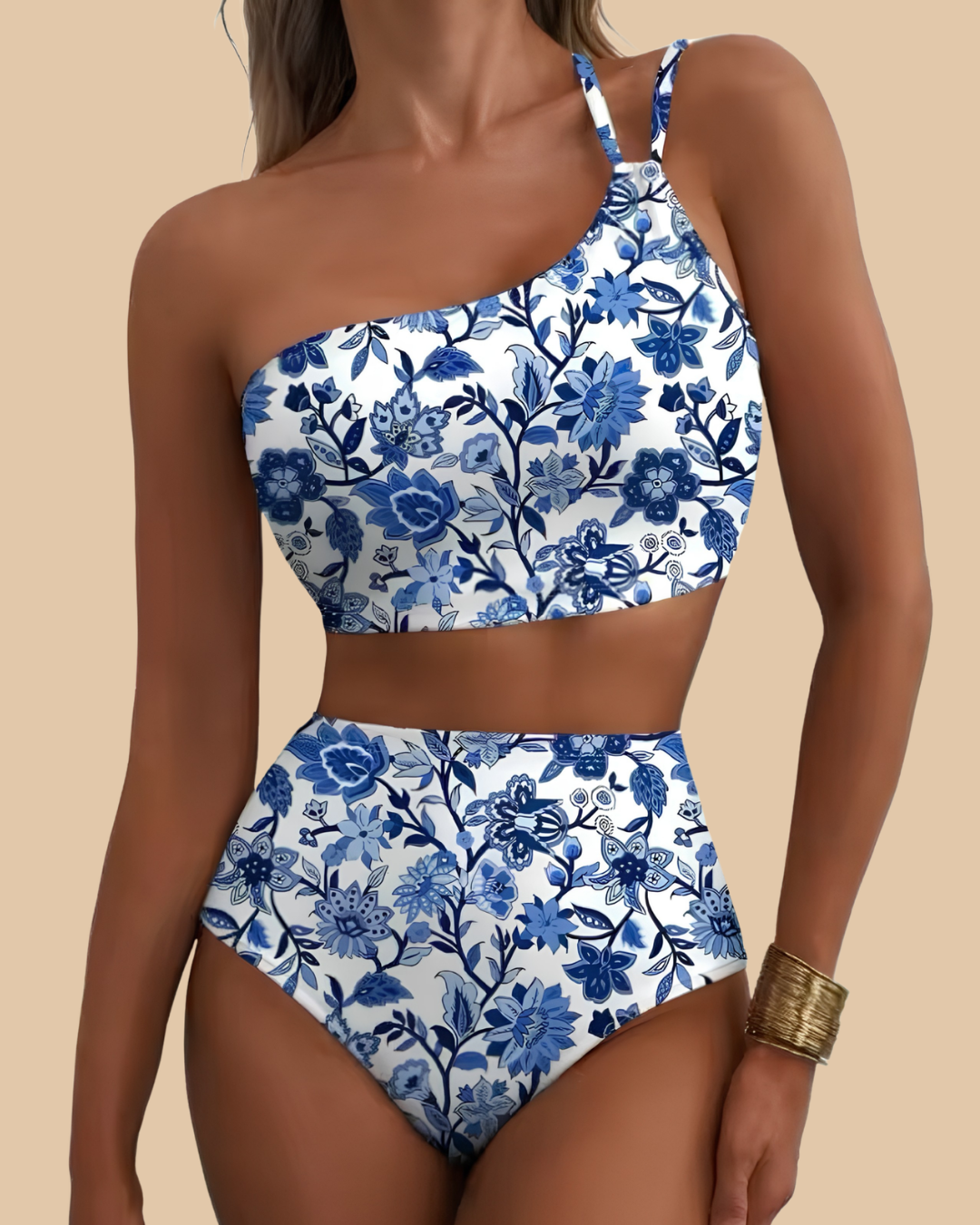 Golden Hour Swimsuit in Porcelain, blue and white floral one-shoulder high-waist bikini, front view on model