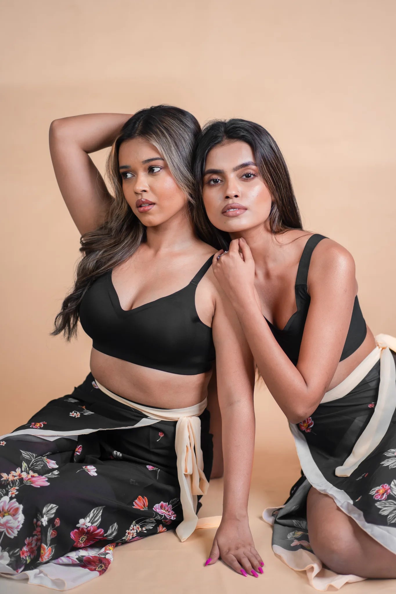 Two models wearing black SHAPE Signature Seamless Bras