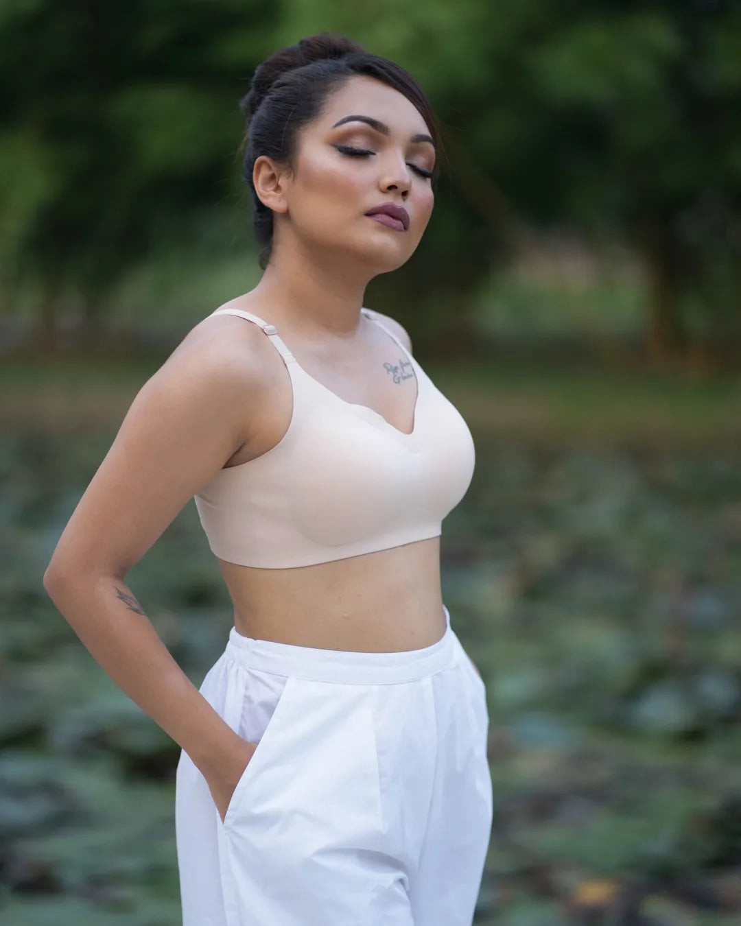 Nude beige SHAPE Signature Seamless Bra, side view, on model